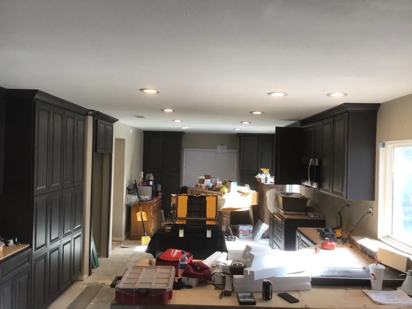 Beaumont chimney leak water damage restoration with mitigation photos, moisture readings, packout storage, and finished reconstruction by PL Builders