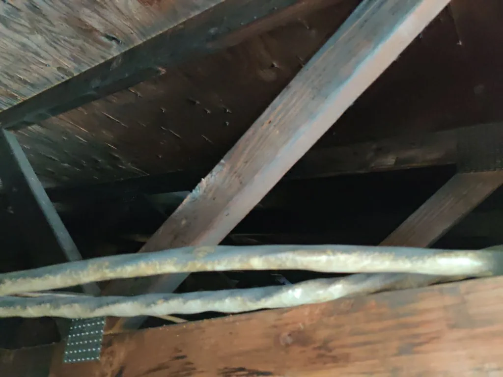charred trusses roof framing hvac soot from Hemet apartment fire smoke damage restoration documentation
