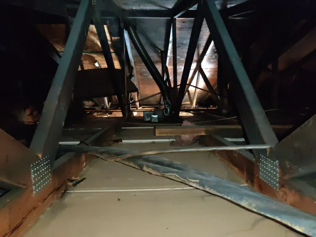 charred trusses roof framing hvac soot from Hemet apartment fire smoke damage restoration documentation