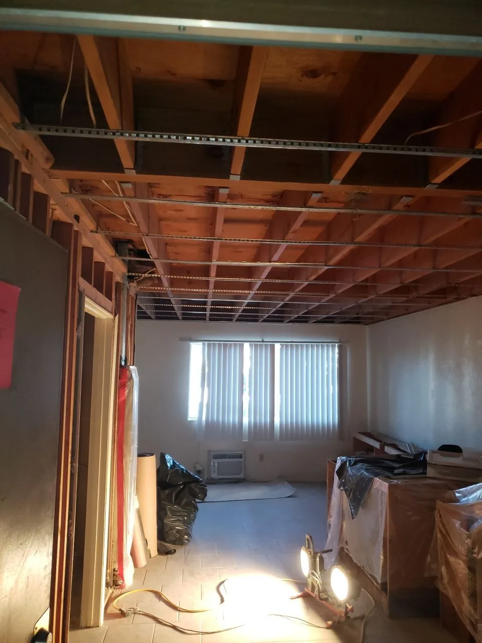 Open ceiling and framing documentation: Hemet apartment fire and smoke damage restoration documentation by PL Builders