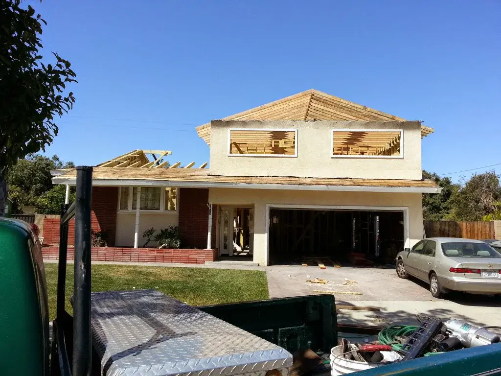 Exterior view of a second story fire rebuild in progress in Anaheim, CA